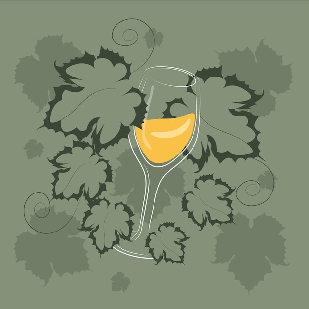 Glass of white wine with grapes leaves