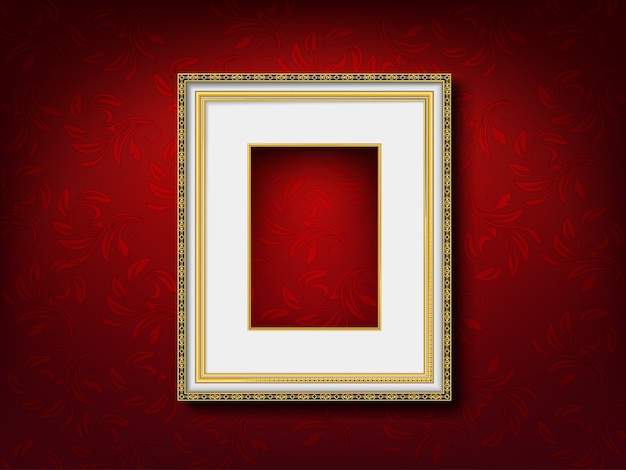 Gold vintage picture frame on red wall 