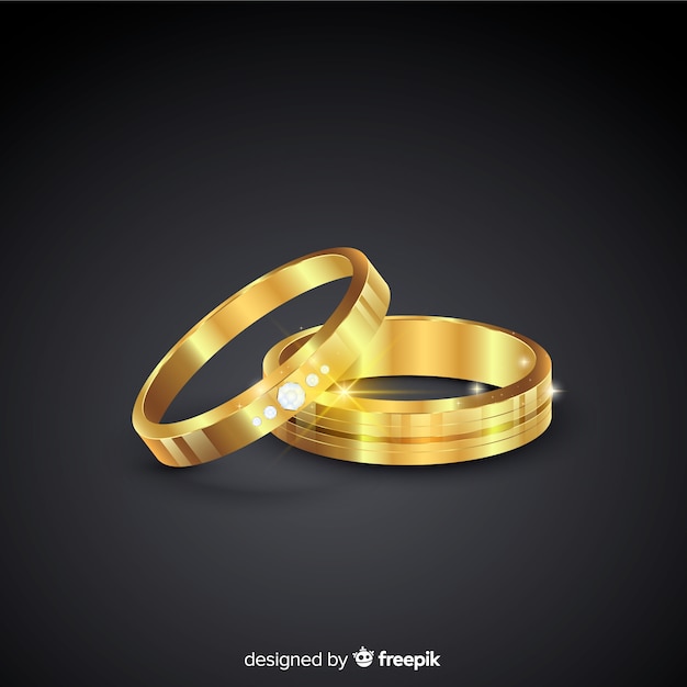 Golden wedding rings in realistic style