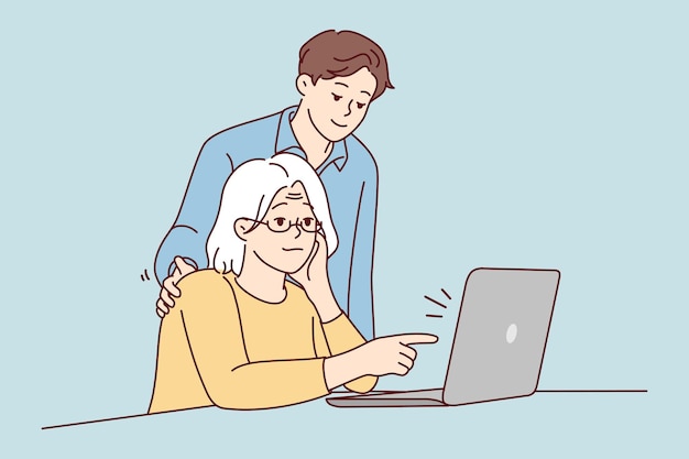 Grandchild help old grandmother with computer