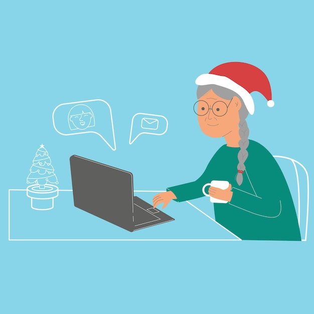 Grandmother with laptop talking to children online during new year holidays