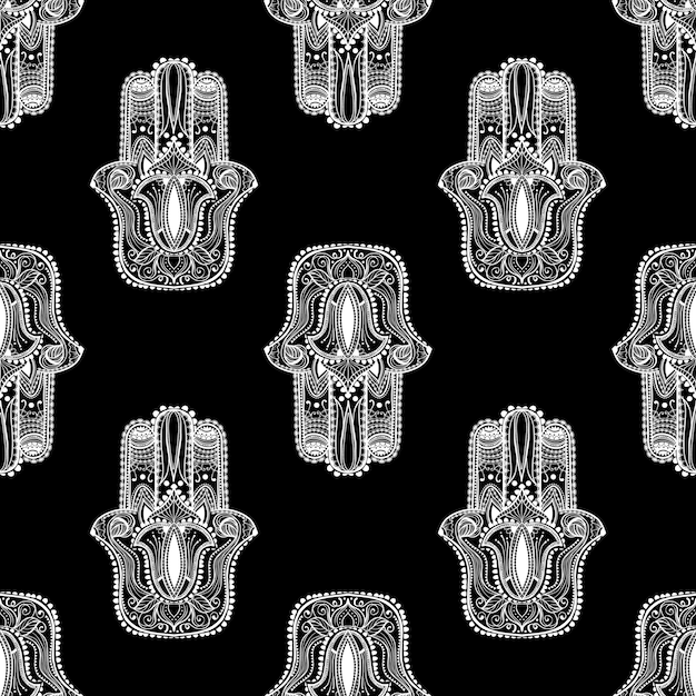 Graphic hand drawn seamless pattern with hamsa in ethnic and boho style Popular amulet