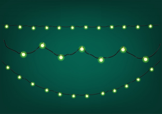 Green garlands on dark background.