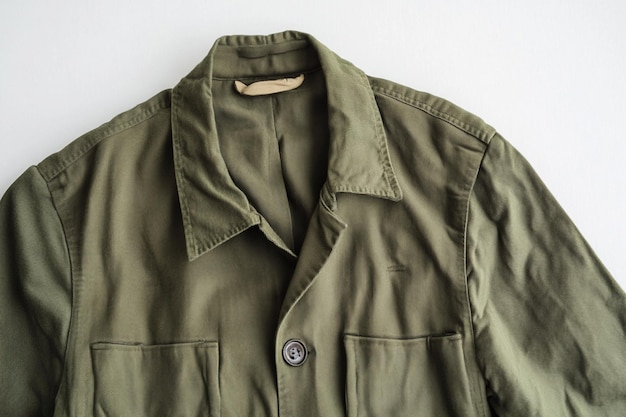 Vector a green jacket with a button on the front and the right collar is open