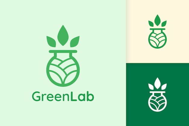 Green lab logo with leaf shape for science or chemistry