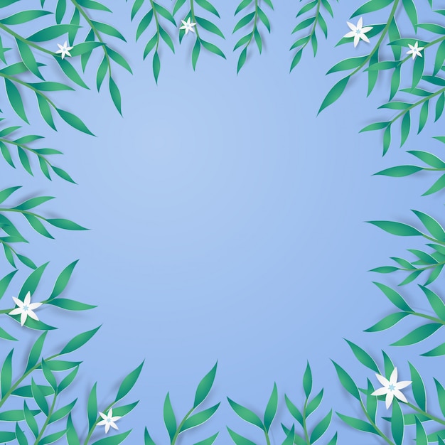 Green leaves and mini flowers on blue background.