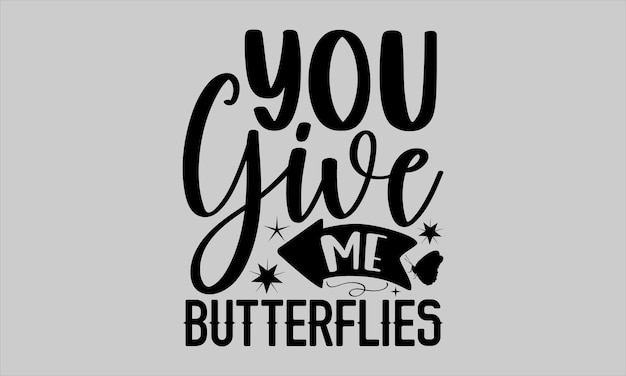 A grey t - shirt with the words you give me butterflies on it.