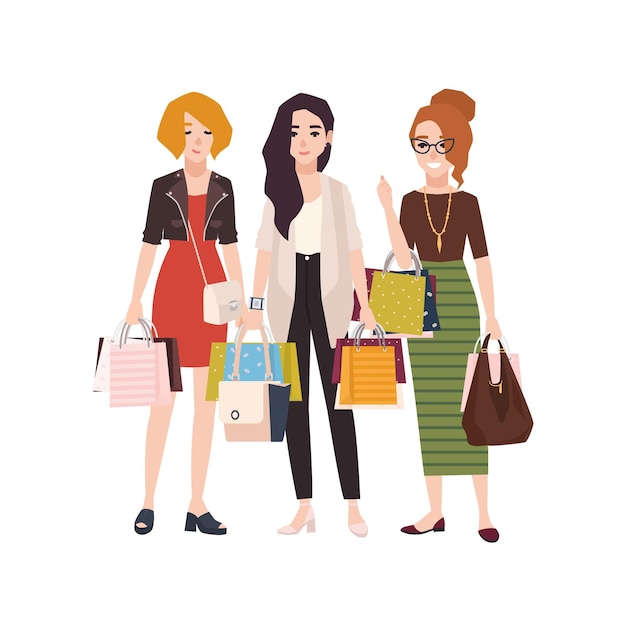 Group of young happy woman holding shopping bags