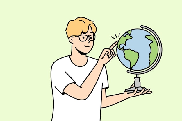 Guy in glasses spin globe