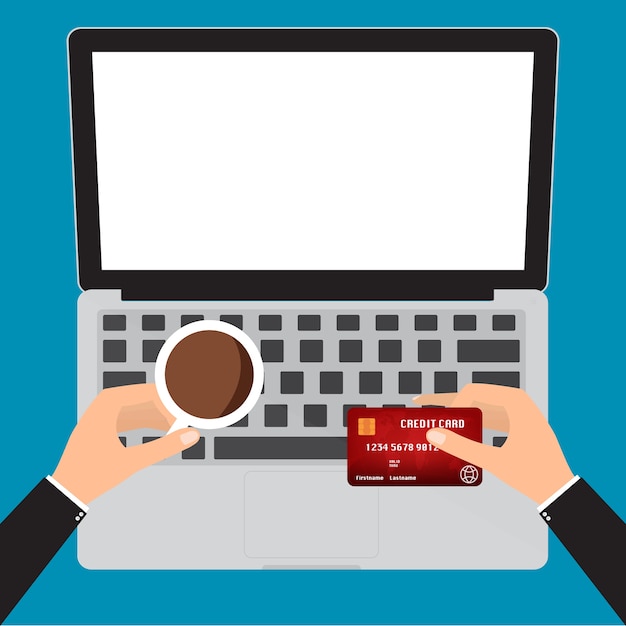 Hand holding coffee cup and credit card for online paying