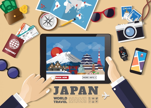 Hand holding smart device booking travel destination. Japan famous places.