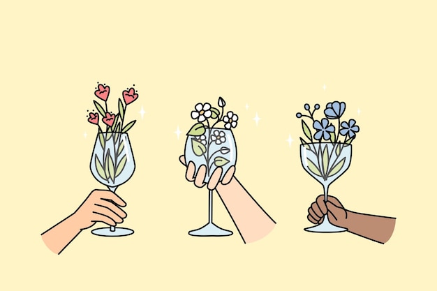 Hands of multiracial people holds wineglasses with flowers