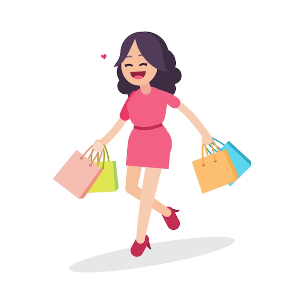 Happy beautiful woman walking with shopping bags