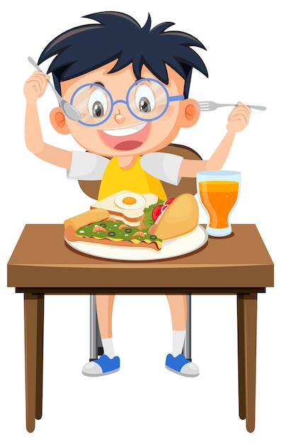 Happy boy enjoy eating food on table