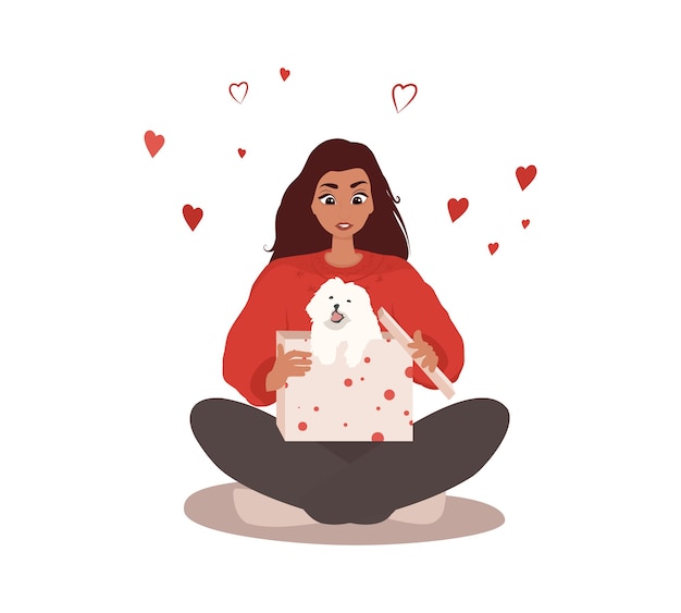 Happy, confused, surprised woman sitting in lotus pose and opening Christmas gift, present, pet, dog