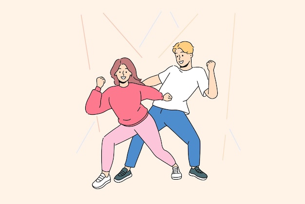 Happy couple in bright clothes dancing together