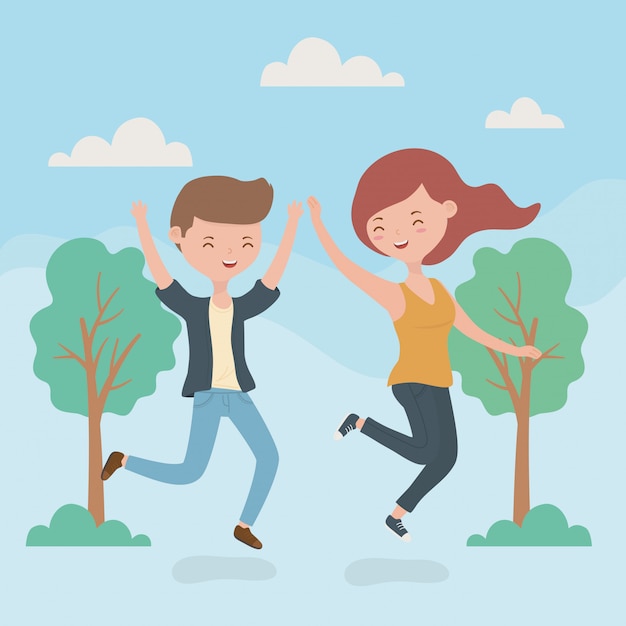 Happy couple celebrating jumping in the forest scene