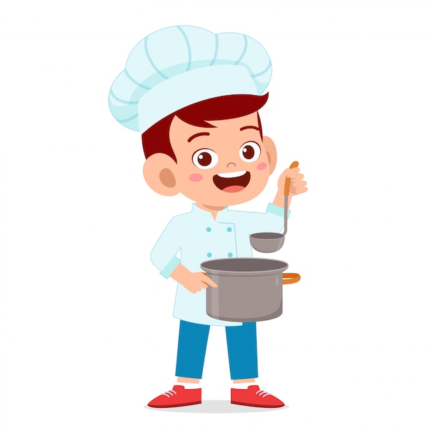 Happy cute kid boy in chef costume