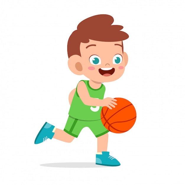 Happy cute kid boy play train basketball