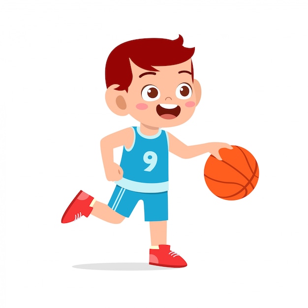 Happy cute kid boy play train basketball