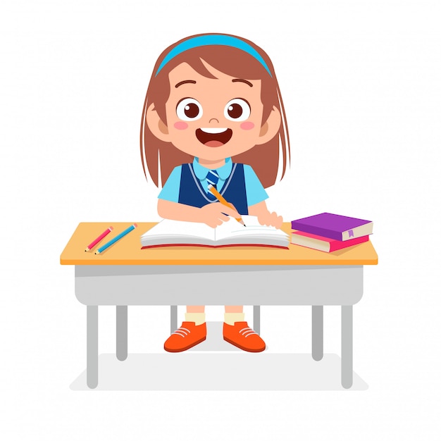 Happy cute kid studying on cute table