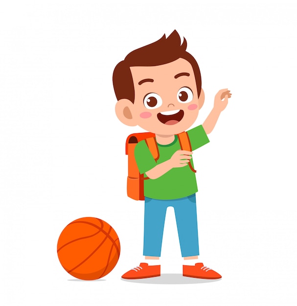 Happy cute little kid boy play basketball