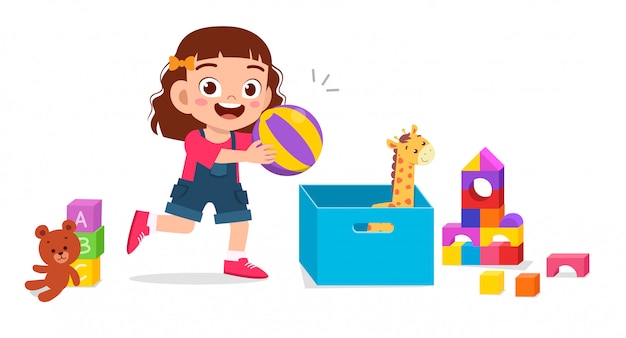 Happy cute little kid girl playing with toys