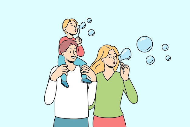 Happy family with kid blowing bubbles