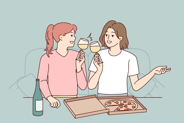 Happy girls eat pizza drink wine