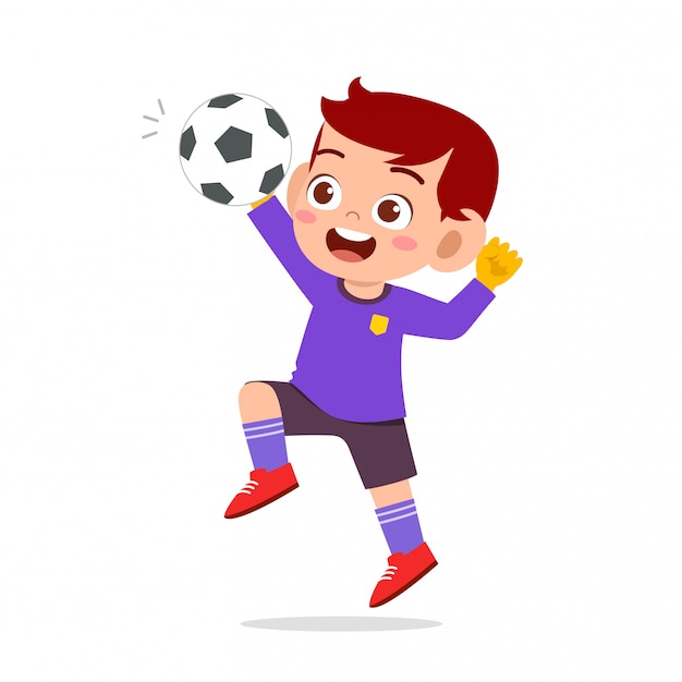 Happy kid boy play soccer as goalkeeper