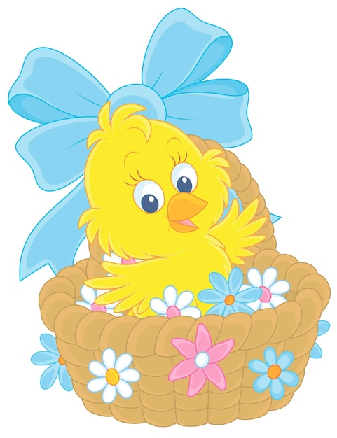 Happy little chick in a wicker Easter basket decorated with a bow and flowers