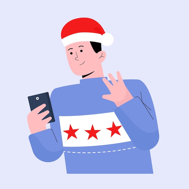 Happy man waving while video call over smart phone on christmas