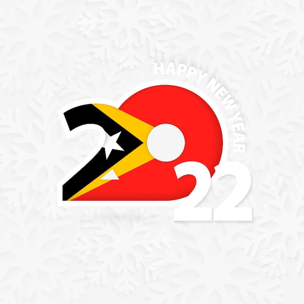 Happy New Year 2022 for East Timor on snowflake background.