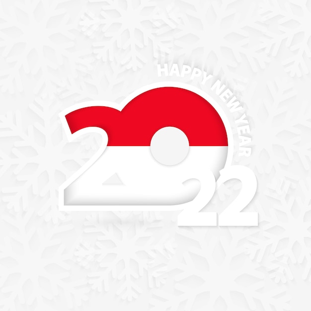 Happy New Year 2022 for Monaco on snowflake background.