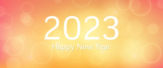 Happy new year 2023 incription on blurred background