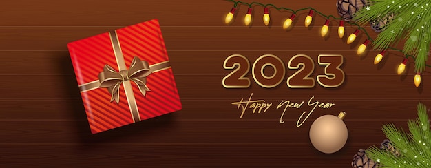 Happy New Year 2023. Wide horizontal Christmas banner with gift box, top view