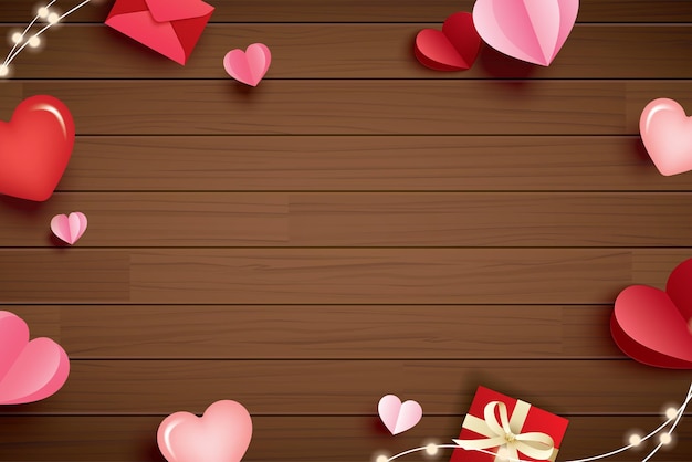 Happy valentines day with paper hearts and copy space on wood background.