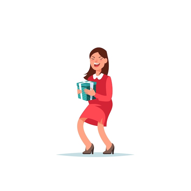 Happy woman holds christmas gift box. Christmas and New Year shopping