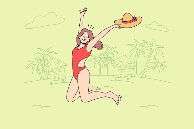 Happy woman in swimsuit jumping on beach