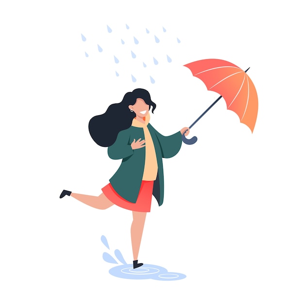 Happy woman with an umbrella in her hands walks in the rain