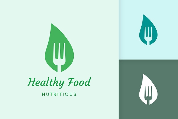 Healthy food logo with fork and leaf shape