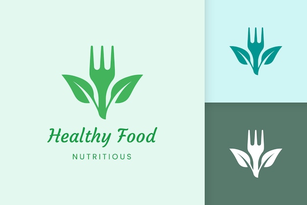 Healthy food logo with fork and leaf shape