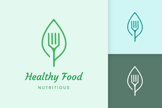 Healthy food logo with fork and leaf shape