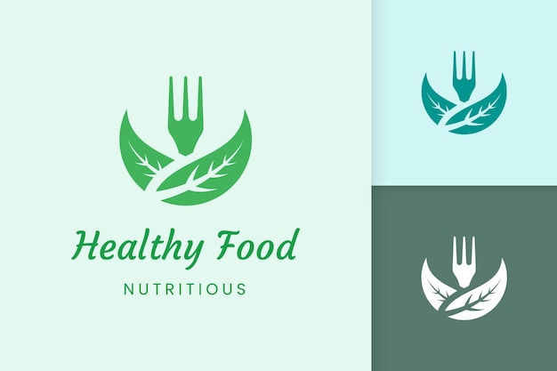 Healthy food logo with fork and leaf shape