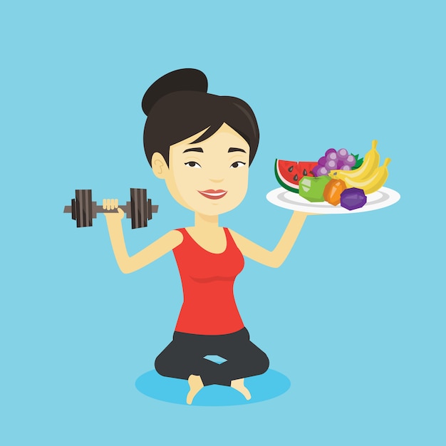 Healthy woman with fruits and dumbbell.