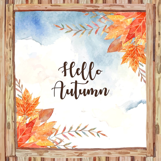 Hello Autumn in the middle of wooden window frame and surround with autumn leaf such as maple and oak.