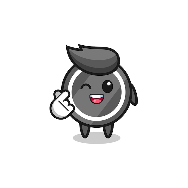 Hockey puck character doing Korean finger heart cute design