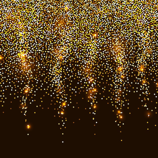 Holiday glitter decoration on black background Spray of gold confetti Christmas sparkly effect