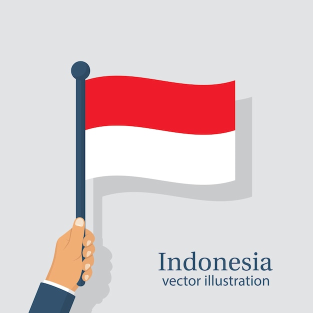 Indonesia flag holding in hand man Independence Day is national holiday of Indonesia Celebrated annually Vector illustration flat design Isolated on white background August 17th