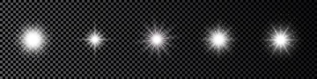 Light effect of lens flares Set of five white glowing lights starburst effects with sparkles